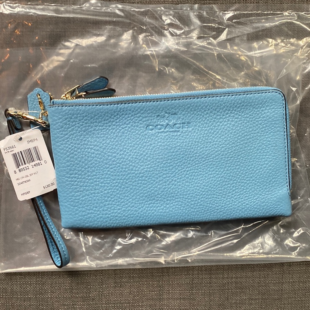 Powder blue coach clutch